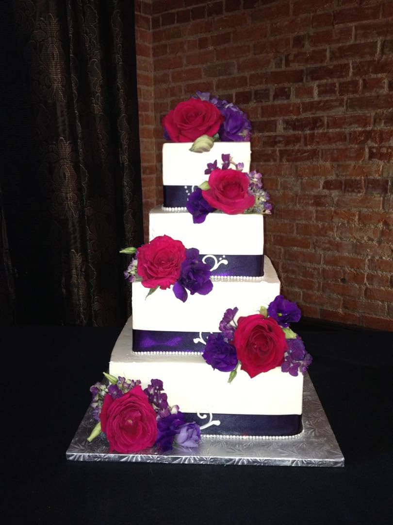 Pink and Purple Flowered Wedding Cake