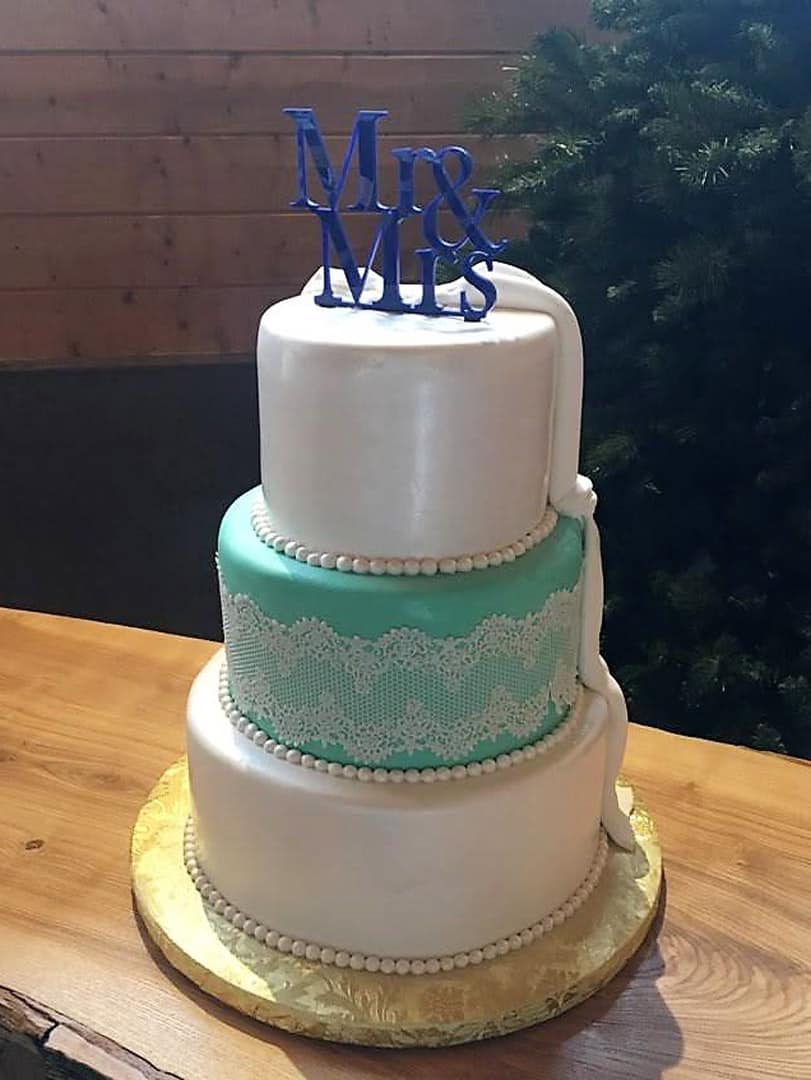 Wedding Cake With Turquoise and Lace