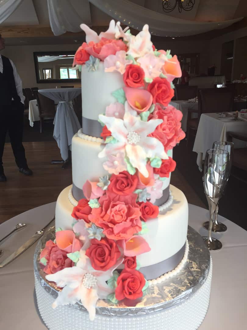 Wedding Cake with Coral Cascading Flowers